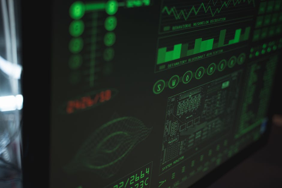 Close-up view of a computer displaying cybersecurity and data protection interfaces in green tones. Close-up view of a computer displaying cybersecurity and data protection interfaces in green tones.