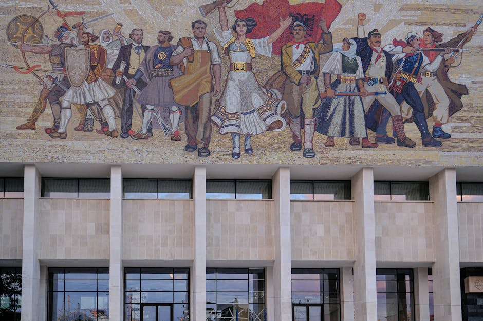 The intricate mosaic facade of the National Historical Museum in Tirana, Albania.