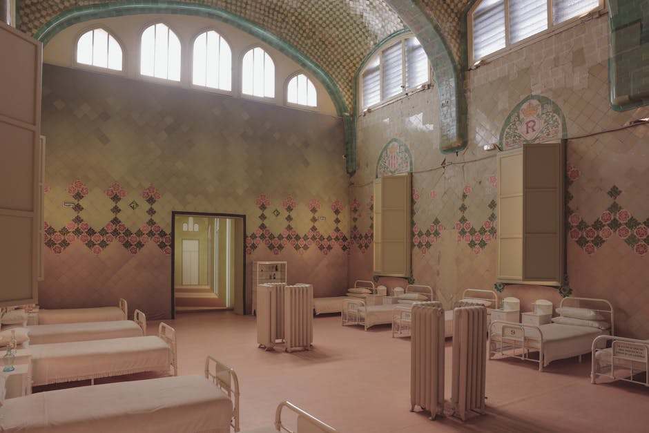 Interior of a historical hospital ward in Barcelona with ornate tiled walls.