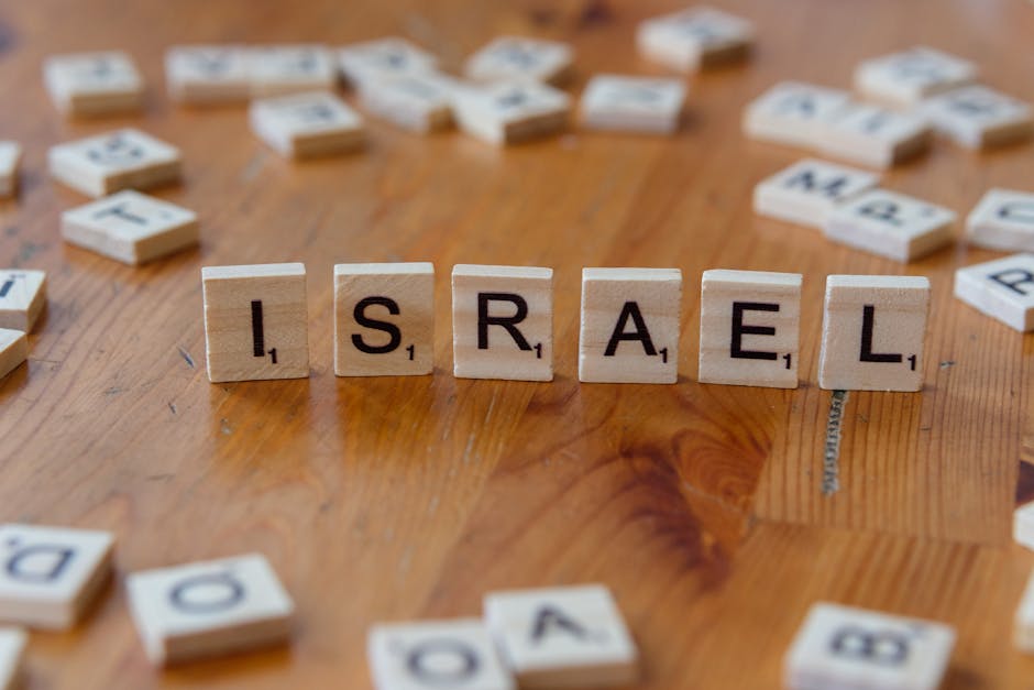 Wooden Scrabble tiles arranged to spell ‘Israel’ on a wooden table. Wooden Scrabble tiles arranged to spell 'Israel' on a wooden table.
